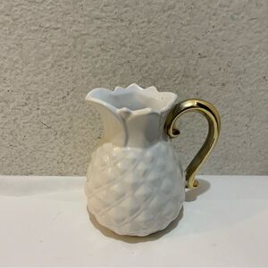 Shiraleah Ceramic pineapple shape design white color Copper accent handle
Jug